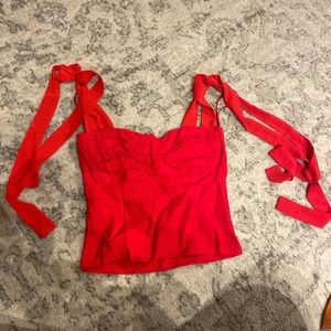 Red corset top with ties on shoulders